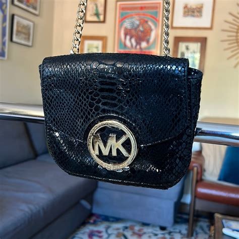 michael kors magnetic closure purse gold|Michael Kors north south messenger.